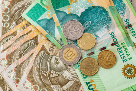 Albanian Currency, banknotes, five thousand Albanian lek notes and coins. Economic and financial...