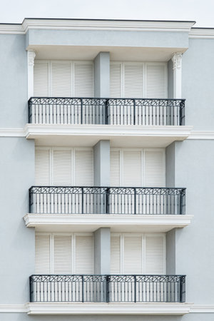 Modern residential building with balconies or terrace. European Architecture Residential buildings. Modern apartment building. Architecture detail Modern facade building with balconies and windowsの写真素材