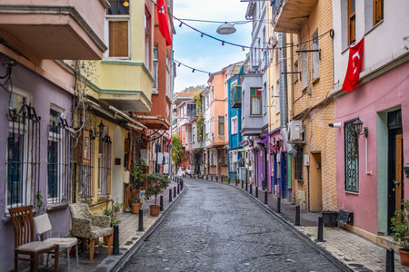 Cobblestone narrow alley with colorful traditional buildings. Istanbul old streets in Balat district, Turkey. Colorful houses in historical site in old town of Istanbul. Travel photo, nobodyの写真素材