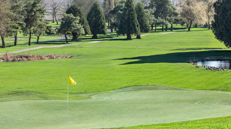 golf course with lush greenery and tranquil surroundings. Golf teeing ground in golf course. Golf course in the countryside. Nobodyの写真素材