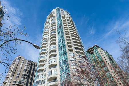 Modern residential buildings, housing development. New apartment buildings under blue sky. High rise residential building of public estate in Vancouver city Canada. Copy space, travel photo, nobodyの写真素材