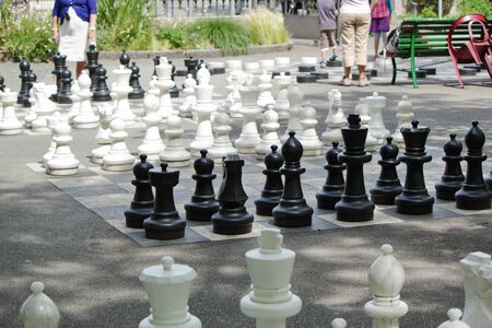 Black and white outdoors chess game in Bastions Park, Geneva, Switzerlandのeditorial素材