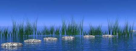 Grey stones as steps and grass in the ocean in deep blue backgroundの写真素材
