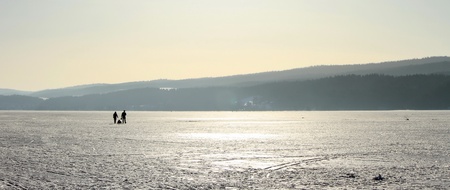 Panoramic view on the frozen lake of the Joux valley by winter day, Vaud canton, Switzerlandの写真素材