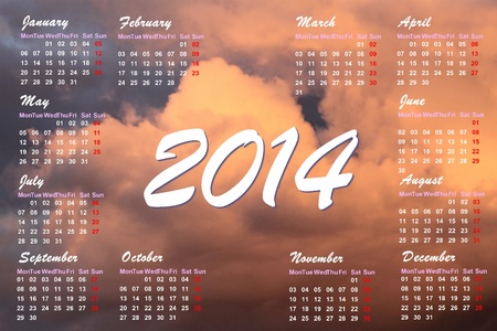 English 2014 monthly calendar and sunset cloudsの写真素材