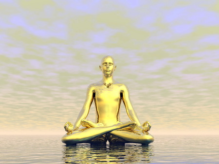 Gold man meditating upon the ocean by grey cloudy dayの写真素材