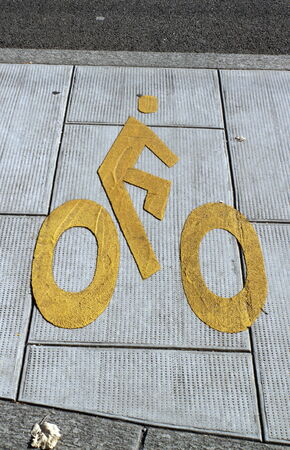 Bicycle sign path on the pavementの写真素材