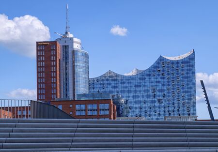 HAMBURG, GERMANY - MAY 29, 2019: Elbphilharmonie concertn hall behind city stairsのeditorial素材