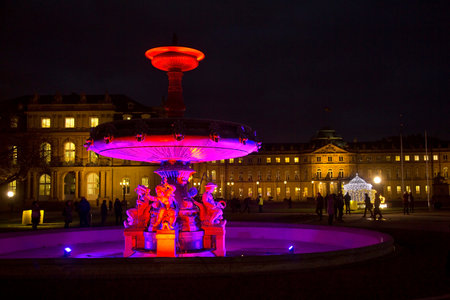 STUTTGART. GERMANY. 13 DECEMBER 2018. Illuminated fountain located on Castle Square in Stuttgart, Germany.のeditorial素材