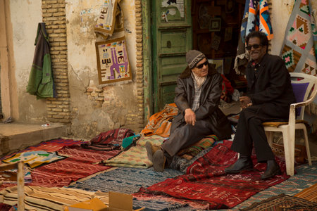 TOZEUR, TUNISIA. 24 DECEMBER 2018.  Carpet trade on the street in Tozeur, Tunisia.