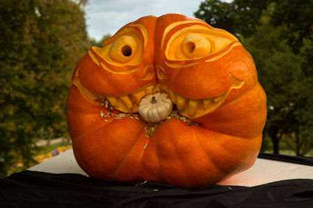 LUDWIGSBURG, GERMANY, 10 OCTOBER 2019. Figures made from a pumpkin in the park of the town of Ludwigsburg, Germany.のeditorial素材