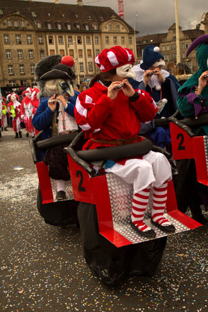 BASEL, SWITZERLAND, 11 MARCH 2019. The traditional carnival parade of carnival masks in Basel, Switzerland.のeditorial素材