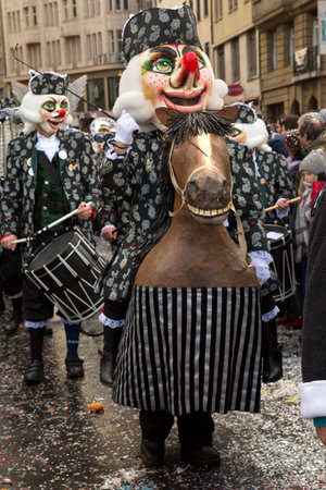 BASEL, SWITZERLAND, 11 MARCH 2019. The traditional carnival parade of carnival masks in Basel, Switzerland.のeditorial素材