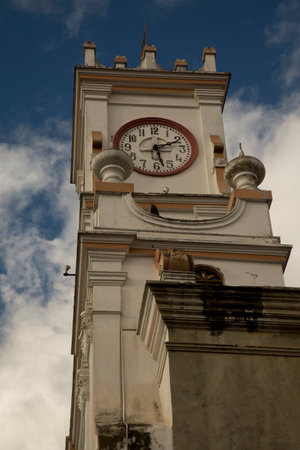 RIOBAMBA, ECUADOR, 27 JUNE 2019. Clock on the tower of the chapel of San Felipe de Neri (Sacrilegio...