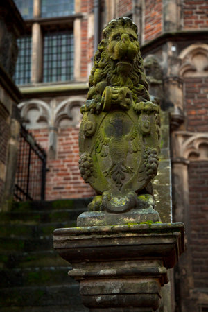 DEVENTER, NETHERLANDS, 15 DECEMBER 2019. A lion decorating the building of  De Waag Historical Museum (Weighing-house) in Deventer, the Netherlands.のeditorial素材