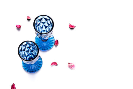 Two empty blue wine glasses on white background, flat lay, horizontal orientation, copy spaceの写真素材