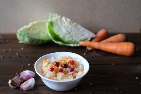 Pickled cabbage with carrot and cranberry. Homemade preserving. Fermented food.の写真素材