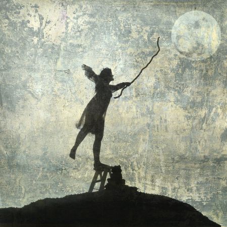 Young woman reaching for the moon. Photo based illustration. の写真素材