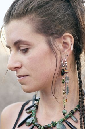 Close up beauty portrait of a natural woman beautifully adorned. Elise Kost Jewelry:: ART Medicine Adornment. の写真素材