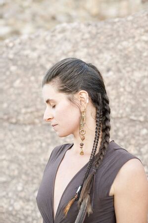 Profile of a natural woman with closed eyes in noble posture. Elsie Kost jewelry. の写真素材