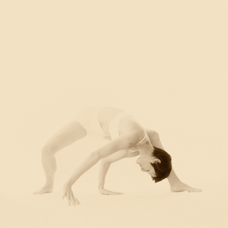 Modern dancer in introspective yoga informed movement  の写真素材