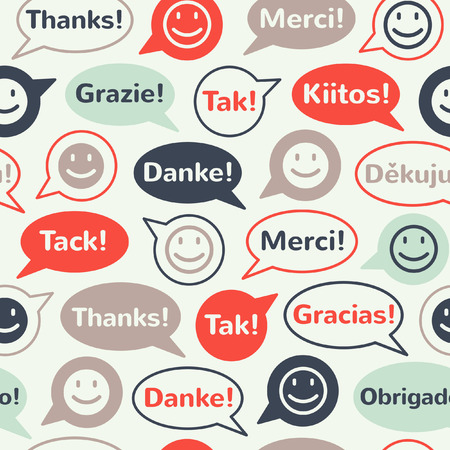 Colorful speech bubbles with smiles and thank you in different languages. Seamless vector pattern. Flat design.のイラスト素材