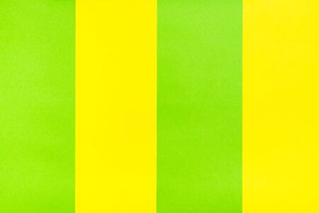 Yellow green stripes of cardboard. Bright background. Copy spaceの写真素材