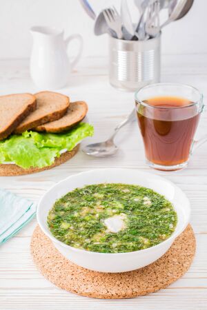 Okroshka is a traditional Russian dish. Cold soup with vegetables and herbs dressed with bread kvassの写真素材