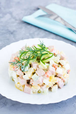 Traditional Russian salad olivier on a plateの写真素材