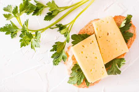Hot sandwich with cheese and parsley. Top viewの写真素材