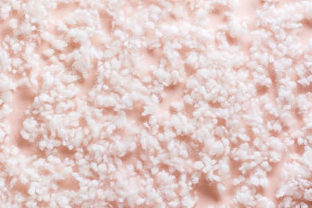 Texture background soft synthetic fluff on a pink backgroundの写真素材