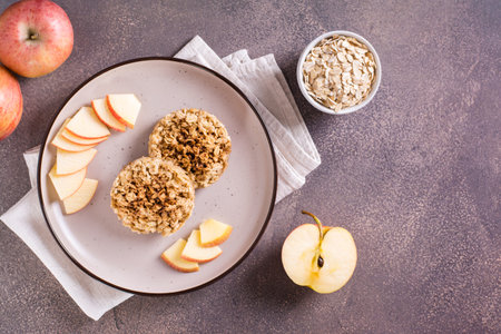 Apple crumble pancakes and fresh apples on plate. homemade desserts. top viewの写真素材