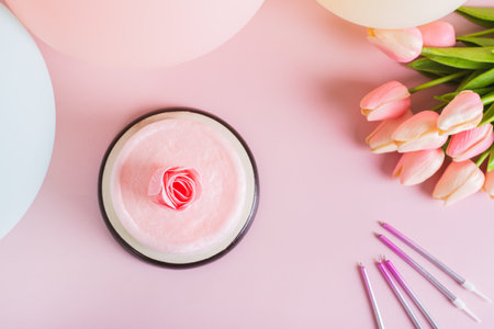 Colored cotton candy cake and party decorations on the table top viewの写真素材