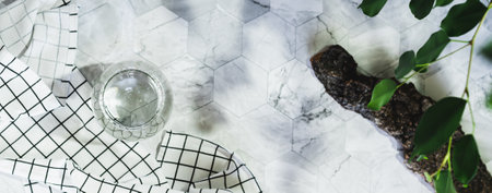 Clear transparent water in glasses in natural background with shadows top view web bannerの写真素材