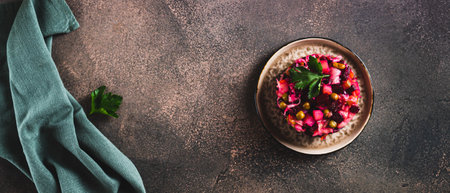 Vegetable vegetarian salad vinaigrette with oil on a plate on the table top view web bannerの写真素材