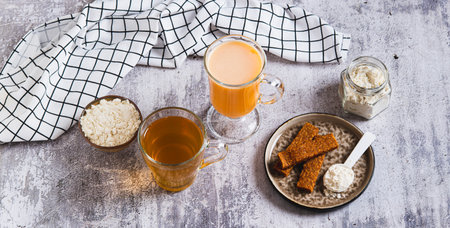 Protein shakes, protein powder, green tea and protein bars for clean eating web bannerの写真素材