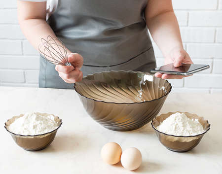 Smartphone for cooking apps display. prescription cooking from your phone.の写真素材