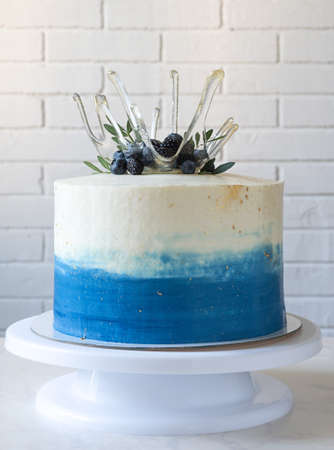 cake with isomalt bowl, berries and leaves. decoration with green pistachio leaves. Step 4 cake...