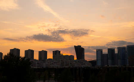 City silhouette against the sky on a sunset