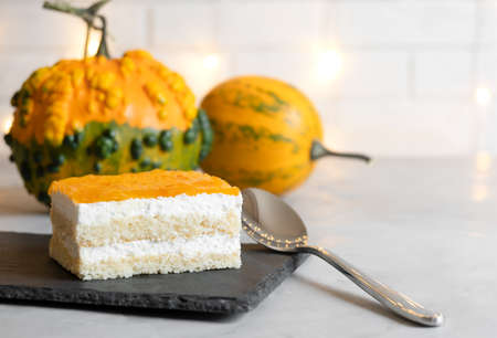 biscuit cake with white cream and pumpkin filling.の写真素材