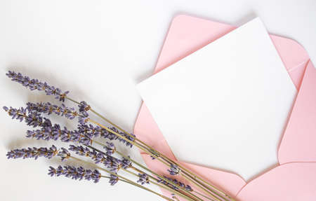 Top view pink envelope with copy space and lavenderの写真素材