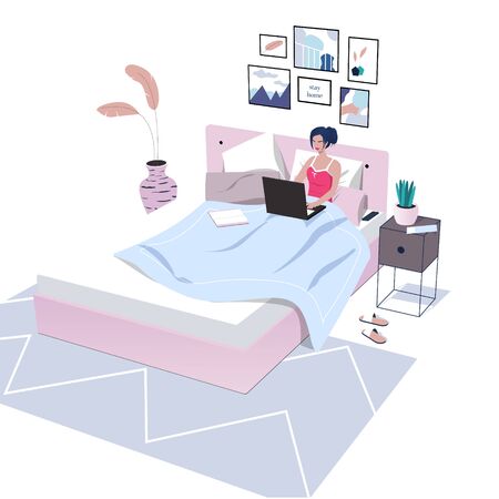 Woman lying in the bed, studying or working at home.のイラスト素材