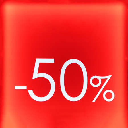 Seasonal sale, black friday and shopping concept. Red stand 50% discount in the store