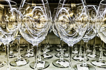 Background of wine glasses. Glass serving dishesの写真素材