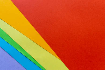 Flat lay of color paper sheets.の写真素材