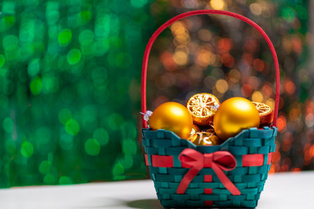 In the green basket are golden ballsの写真素材