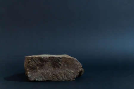 stone large podium on a black backgroundの写真素材