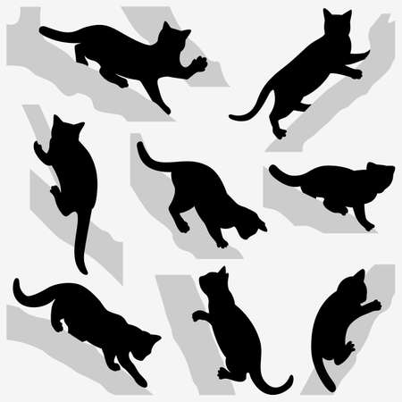 Set of cats on a trees. Silhouettes on a white background.のイラスト素材