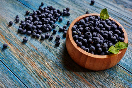 Fresh blueberries on the table in a deep dish, the chef prepared it for filling for croissantsの写真素材