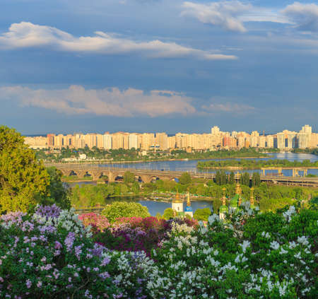 View of Kiev city from Botanic Garden before storm at sunsetの写真素材